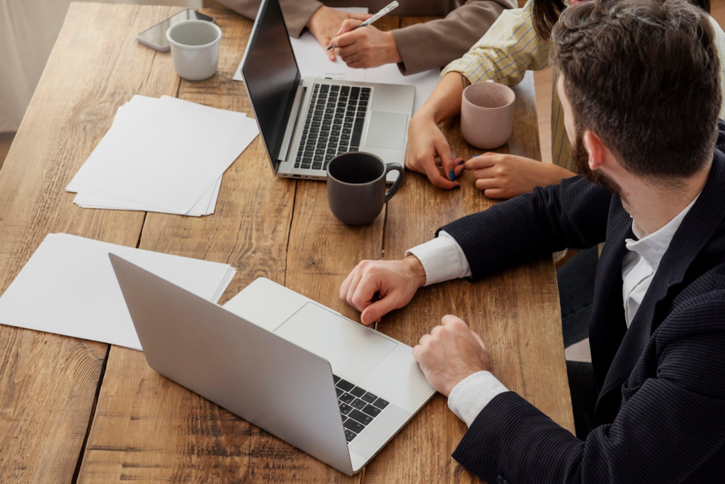 People working with laptops in the office